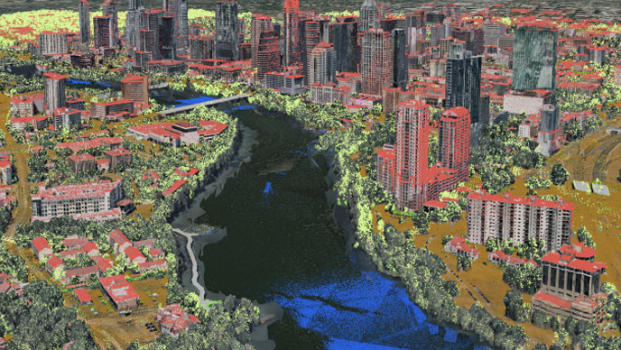 3D urban model with buildings and vegetation surrounding a river.